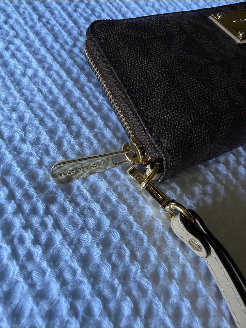 Michael Kors Black Pebble Leather Wristlet with Gold Plate and Taupe Strap